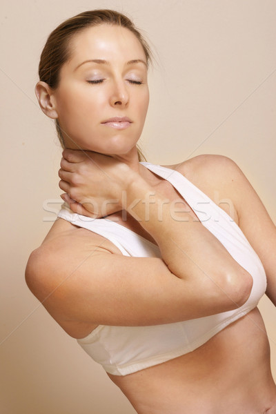 Ranire femeie îmbrăcăminte gât entorsa Imagine de stoc © lovleah