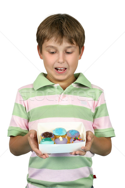 Child holding yummy cupcakes Stock photo © lovleah