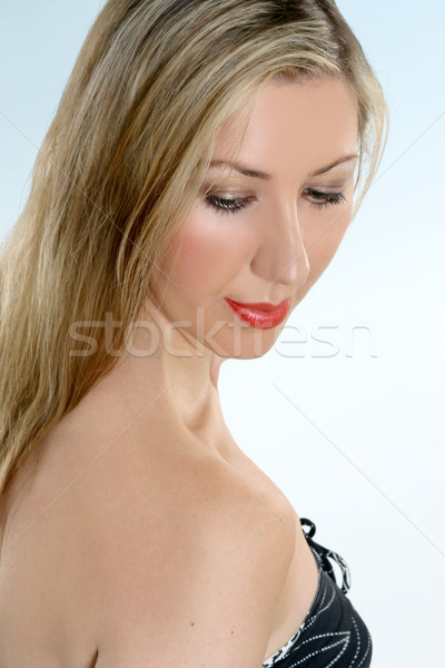 Beautiful woman looking down Stock photo © lovleah