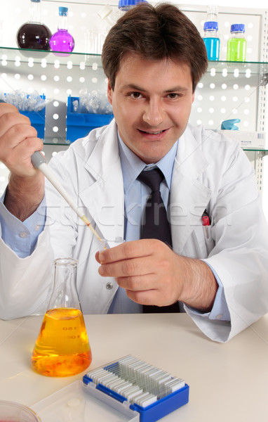 Scientist or chemist  at work in laboratory Stock photo © lovleah