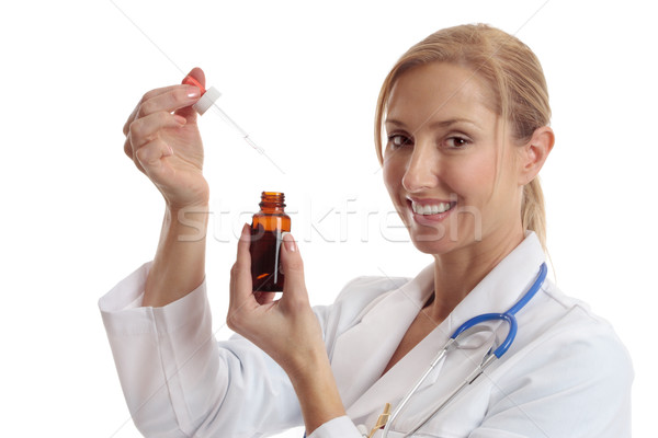 Arzt halten Flasche Gesicht glücklich weiblichen Stock foto © lovleah