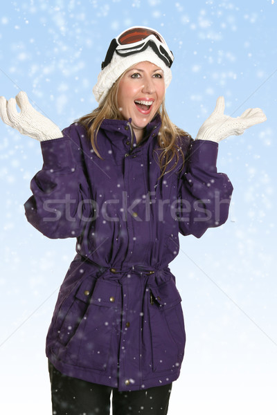 Joyous woman in snow fall Stock photo © lovleah