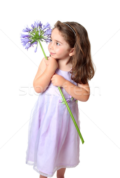 Pretty girl holding a flower Stock photo © lovleah