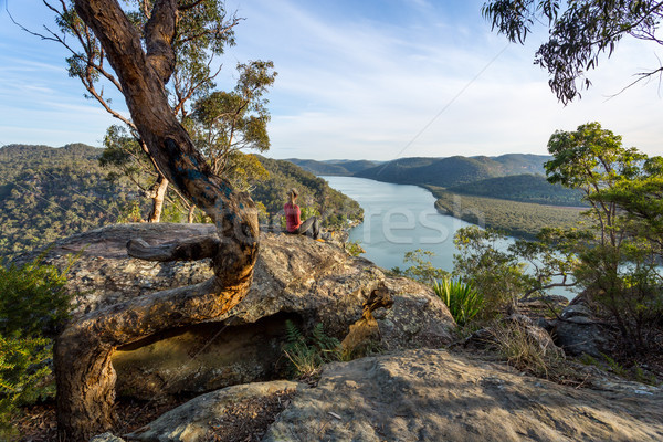 Woman chillaxing with river views in Australian bushland Stock photo © lovleah
