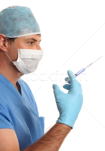 Chirurg medic disponibil seringă Imagine de stoc © lovleah