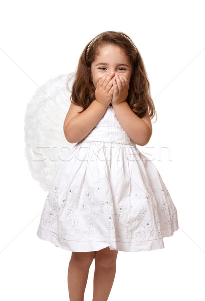 Little angel girl with hands covering her mouth Stock photo © lovleah