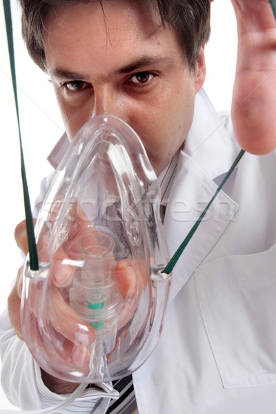 Orvos oxigénmaszk dől beteg nyújtás rugalmas Stock fotó © lovleah