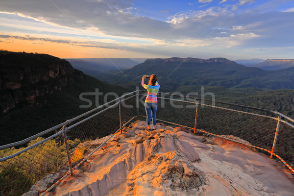 Capturing a photo of sunrise mountain lookout Stock photo © lovleah