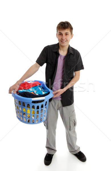 Stock photo: Teenager with laundry