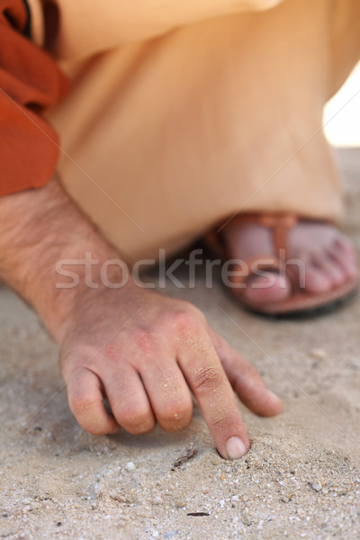 Jesus schriftlich Finger Recht nach unten Boden Stock foto © lovleah