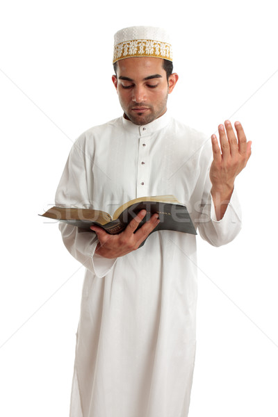 Teacher or Preacher reading from a book Stock photo © lovleah