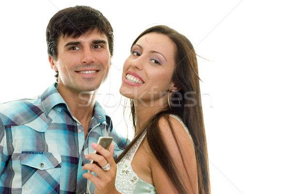 Smiling couple enjoying music together Stock photo © lovleah