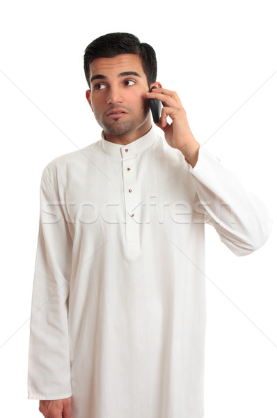 Ethnic businessman on cellphone Stock photo © lovleah