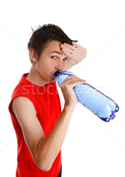 Izzadt fiú iszik palackozott víz tini hegyorom Stock fotó © lovleah