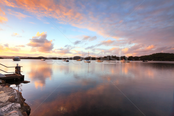 Pôr do sol reflexões Austrália barcos nuvem tarde Foto stock © lovleah