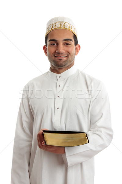Man holding a book and smiling Stock photo © lovleah
