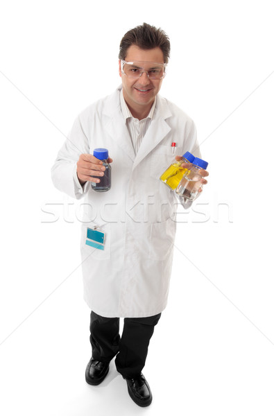 Scientist carrying lab bottles Stock photo © lovleah