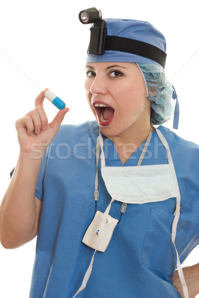 Surgeon Doctor Hard pill to swallow Stock photo © lovleah
