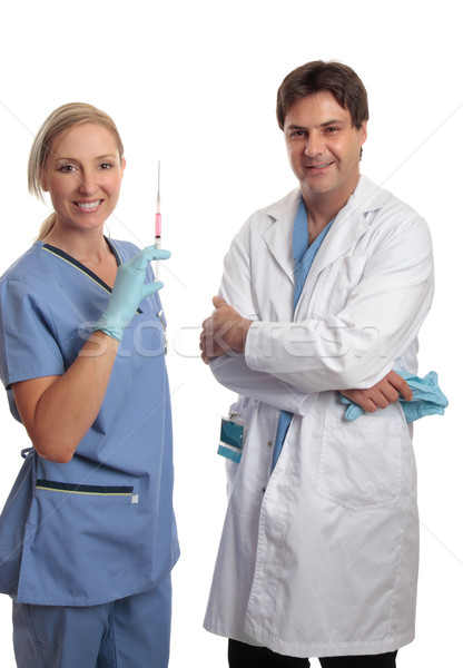 Surgeon and scrub nurse Stock photo © lovleah