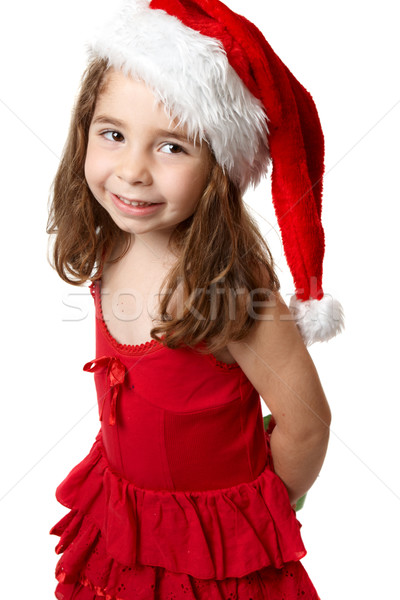 Stock photo: Smiling girl in red santa hat