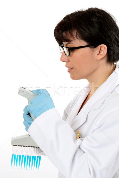 Scientist programming pipette Stock photo © lovleah