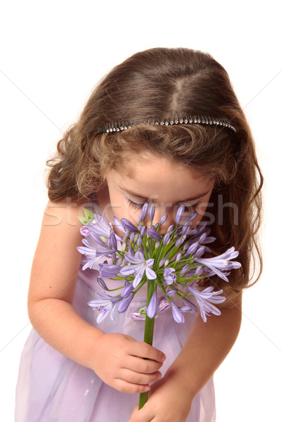 Young girl sniffing flower Stock photo © lovleah