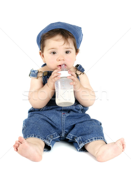 Baby drinking from milk bottle Stock photo © lovleah