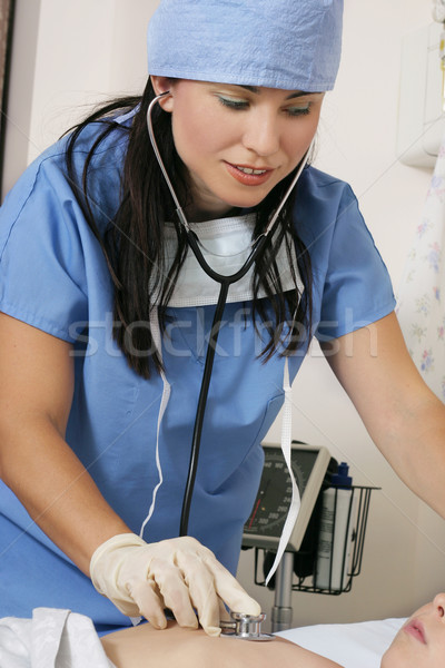 Patient care listening to chest Stock photo © lovleah