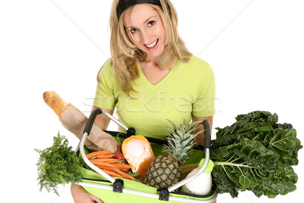 Female with eco shopping bag filled with groceries Stock photo © lovleah