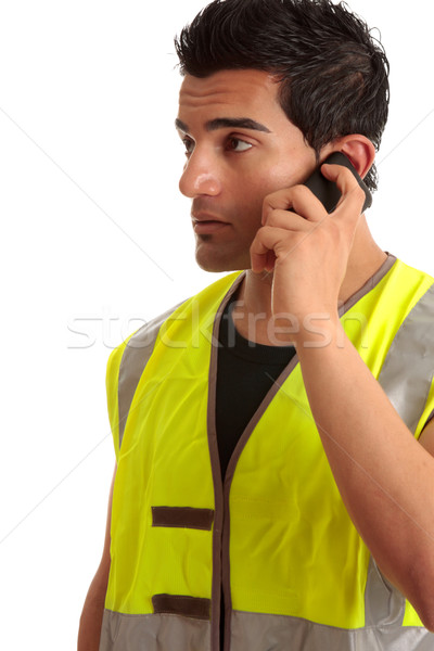 Tradesman handyman on the phone Stock photo © lovleah