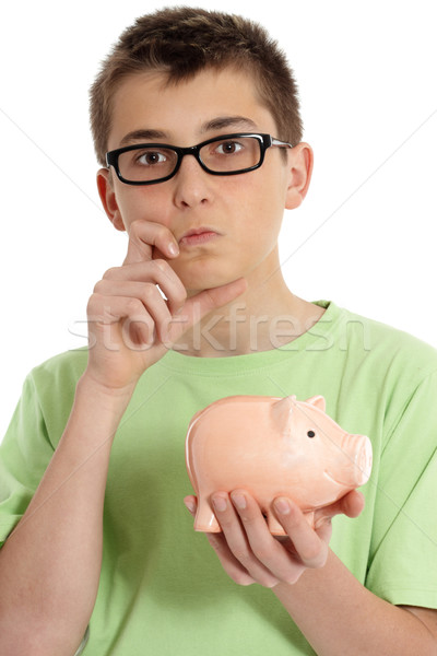 Fiú megtakarított pénz dilemma visel zöld póló Stock fotó © lovleah