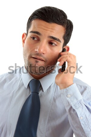 Businessman on mobile phone thinking Stock photo © lovleah