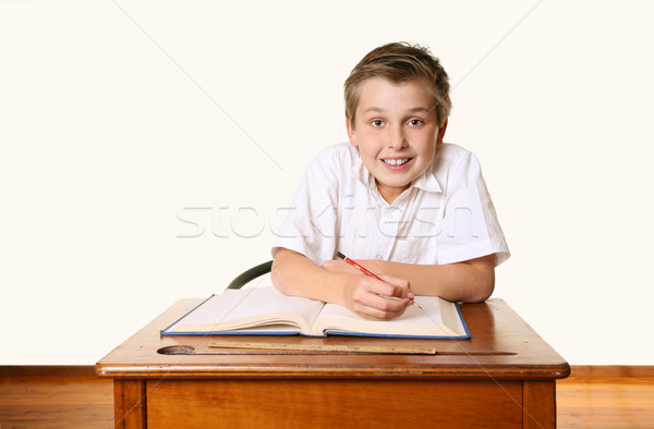 Buzgó boldog iskola diák fiú ül Stock fotó © lovleah