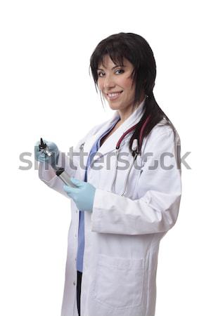 Doctor with otoscope. Stock photo © lovleah