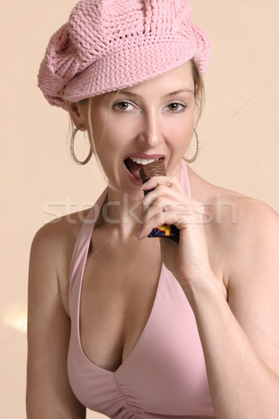 Woman eating a tasty chocolate bar Stock photo © lovleah