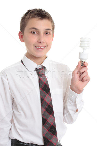 Student holding eco friendly light bulb Stock photo © lovleah