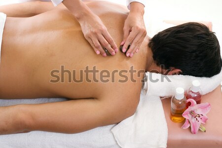Massagem mulher Óleo ajudar mãos clientes Foto stock © lovleah