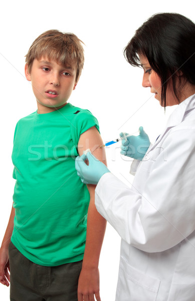 Doctor giving patient injection Stock photo © lovleah