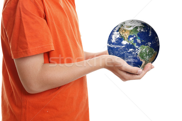 Stock photo: Hands cupping holding our planet Earth