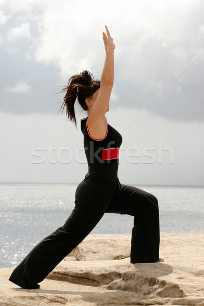 Stock photo: Female fitness lunge stretch