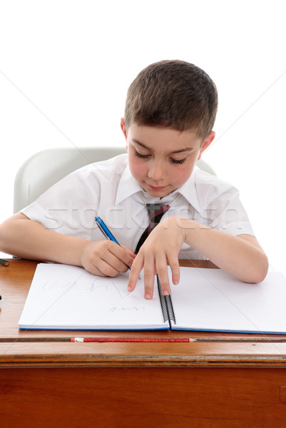 Studious boy doing school work Stock photo © lovleah