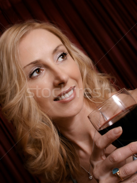 Party night, or weekend wind down - female with glass of red win Stock photo © lovleah