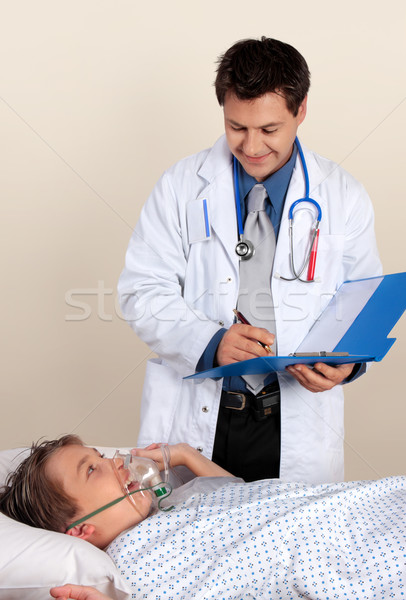 Doctor assessing patient Stock photo © lovleah