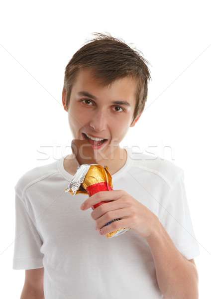 Boy eating chocolate bunny Stock photo © lovleah