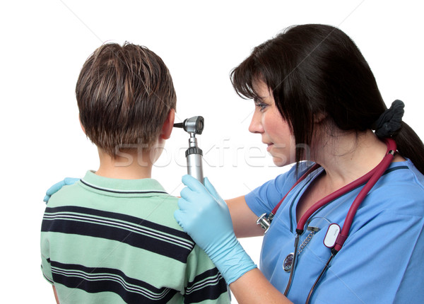 Arzt weiblichen einheitliche Patienten Ohr Stock foto © lovleah