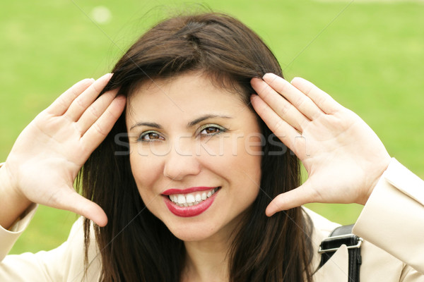 Souriant Homme mains visage belle brunette [[stock_photo]] © lovleah