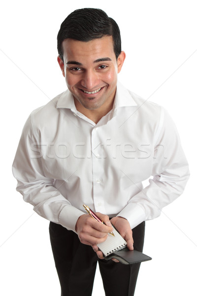 Happy businessman, waiter etc with pen and notepad Stock photo © lovleah
