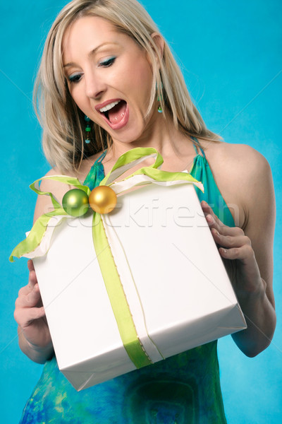 Gift present bring a smile to a woman Stock photo © lovleah