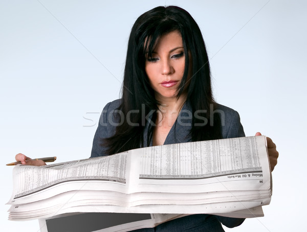 Businesswoman reading newspaper Stock photo © lovleah