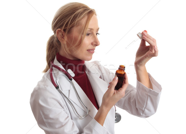 Arzt Flasche halten Salbe homöopathische Lösung Stock foto © lovleah